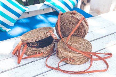 Handmade natural organic rattan handbag. Tropical island of Bali. Eco-bag concept. Ecobags from Bali.の写真素材