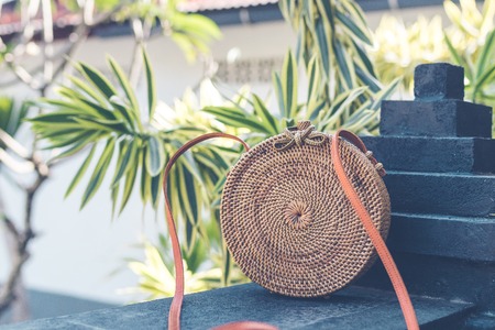 Natural organic handmade rattan handbag closeup. Nude.の写真素材