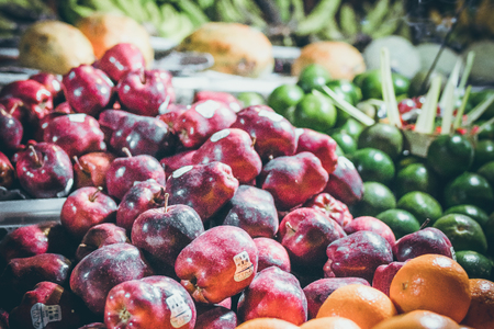 Variety of fresh fruits on organic food night market. Bali island, Indonesia.の写真素材