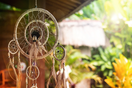 Dream catcher in a magical balinese garden. Bali island.の写真素材