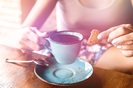 Woman drinking balinese coffee bali kopi. Bali island.の写真素材