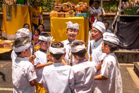 BALI, INDONESIA - OCTOBER 3, 2018: Balinese boys ritual dance in traditional costume on a balinese...