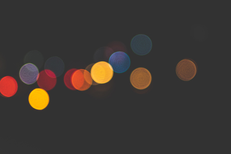 Bokeh from street lights, cars and motorbikes at night. Bali island bokeh. Asia.の写真素材