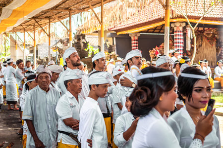 BALI, INDONESIA - OCTOBER 9, 2018: Balinese woman on a big ceremony in Ubud, Pejeng.