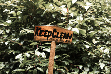 Keep clean wooden sign board in the rainforest of magic island of Bali, Indonesia.