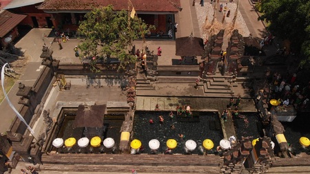 BALI, INDONESIA - SEPTEMBER 25, 2018: 4K aerial flying video of Pura Tirta Empul from above. Balinese temple.のeditorial素材