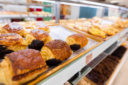Closeup of fresh bakery products in the shop. Wheat, bake, food.の写真素材