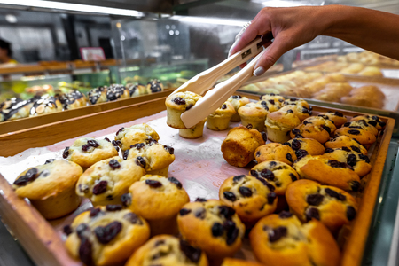 Closeup of fresh bakery products in the shop. Wheat, bake, food.の写真素材