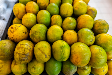 Fresh organic mandarins on a local food market, Bali island. Indonesia.の写真素材