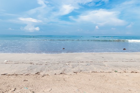 Tropical beach view. Calm and relaxing empty beach scene, blue sky and white sand. Tranquil nature concept. Bali.の写真素材