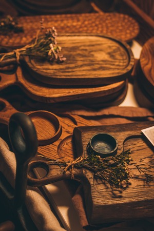 Handmade cutting boards and vintage wooden dishes. Wooden kitchenware. Cooking. Brown, vintage, wood.の写真素材