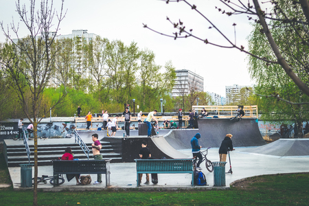 MOSCOW, RUSSIA - MAY 1, 2019: Teenagers having fun in a skate park.のeditorial素材
