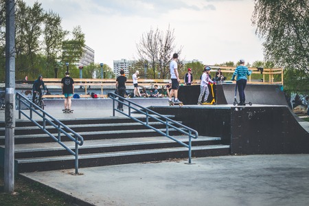 MOSCOW, RUSSIA - MAY 1, 2019: Teenagers having fun in a skate park.のeditorial素材
