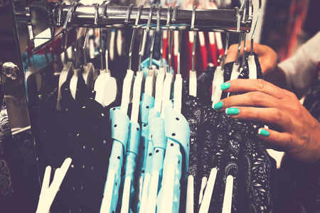 Women clothes in shopping mall. Fashion store. Fashion clothes. Women clothing.の写真素材