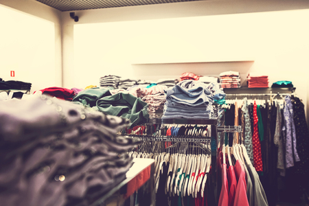 Women clothes in shopping mall. Fashion store. Fashion clothes. Women clothing.の写真素材