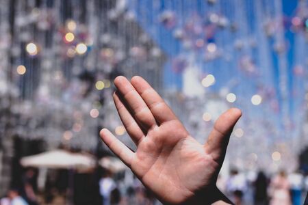 Teenager palm closeup, outdoor shot. Male hand.の写真素材