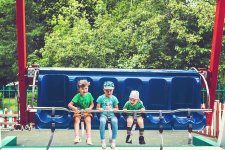 MOSCOW, RUSSIA - JUNE 2, 2019: Kids at amusement park.のeditorial素材
