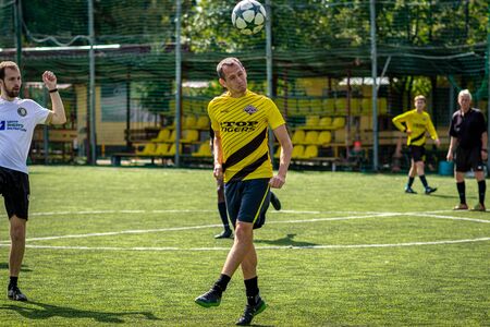 MOSCOW, RUSSIA - AUGUST 24, 2019: Soccer players in game. Amateur league in Moscow.のeditorial素材