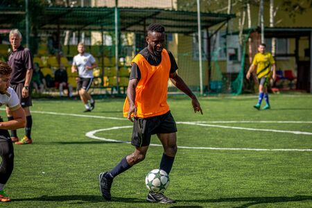 MOSCOW, RUSSIA - AUGUST 24, 2019: Soccer players in game. Amateur league in Moscow.のeditorial素材