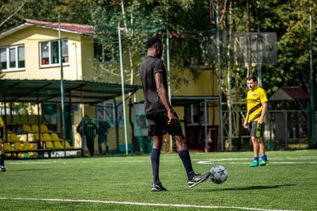 MOSCOW, RUSSIA - AUGUST 24, 2019: Soccer players in game. Amateur league in Moscow.のeditorial素材