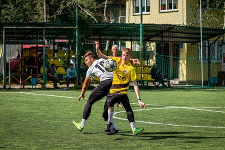 MOSCOW, RUSSIA - AUGUST 24, 2019: Soccer players in game. Amateur league in Moscow.のeditorial素材