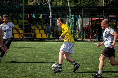MOSCOW, RUSSIA - AUGUST 24, 2019: Soccer players in game. Amateur league in Moscow.のeditorial素材