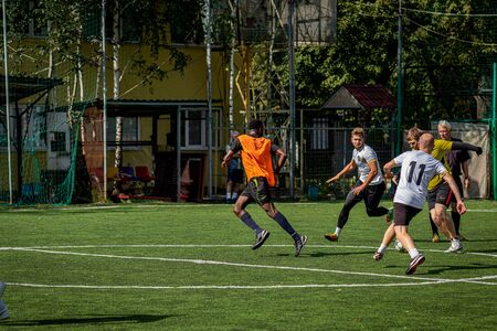 MOSCOW, RUSSIA - AUGUST 24, 2019: Soccer players in game. Amateur league in Moscow.のeditorial素材