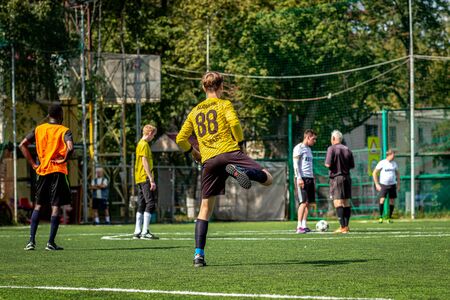 MOSCOW, RUSSIA - AUGUST 24, 2019: Soccer players in game. Amateur league in Moscow.のeditorial素材