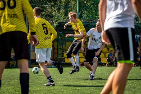 MOSCOW, RUSSIA - AUGUST 24, 2019: Soccer players in game. Amateur league in Moscow.のeditorial素材