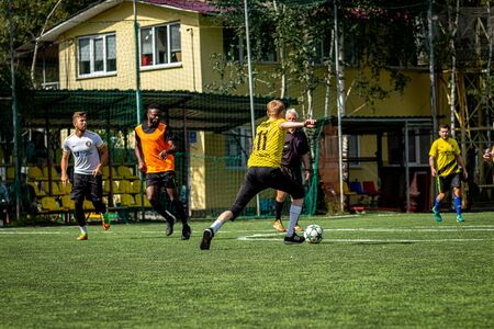 MOSCOW, RUSSIA - AUGUST 24, 2019: Soccer players in game. Amateur league in Moscow.のeditorial素材