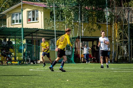 MOSCOW, RUSSIA - AUGUST 24, 2019: Soccer players in game. Amateur league in Moscow.のeditorial素材