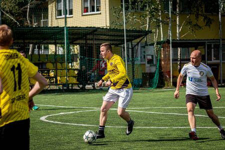 MOSCOW, RUSSIA - AUGUST 24, 2019: Soccer players in game. Amateur league in Moscow.のeditorial素材