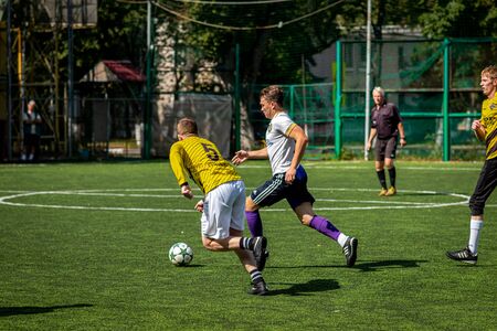MOSCOW, RUSSIA - AUGUST 24, 2019: Soccer players in game. Amateur league in Moscow.のeditorial素材