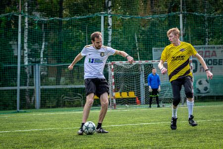 MOSCOW, RUSSIA - AUGUST 24, 2019: Soccer players in game. Amateur league in Moscow.のeditorial素材