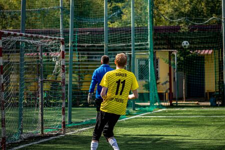 MOSCOW, RUSSIA - AUGUST 24, 2019: Soccer players in game. Amateur league in Russia.のeditorial素材