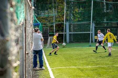 MOSCOW, RUSSIA - AUGUST 24, 2019: Soccer players in game. Amateur league in Russia.のeditorial素材