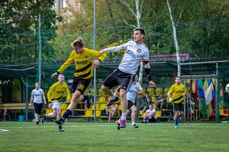MOSCOW, RUSSIA - AUGUST 24, 2019: Soccer players in game. Amateur league in Russia.のeditorial素材