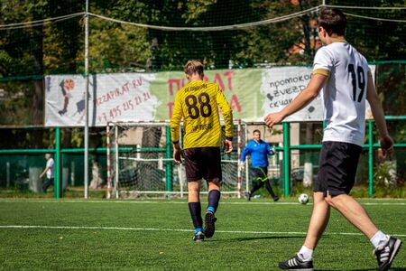 MOSCOW, RUSSIA - AUGUST 24, 2019: Soccer players in game. Amateur league in Russia.のeditorial素材