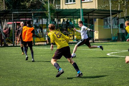 MOSCOW, RUSSIA - AUGUST 24, 2019: Soccer players in game. Amateur league in Russia.のeditorial素材