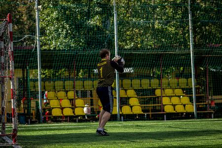 MOSCOW, RUSSIA - AUGUST 24, 2019: Soccer players in game. Amateur league in Russia.のeditorial素材