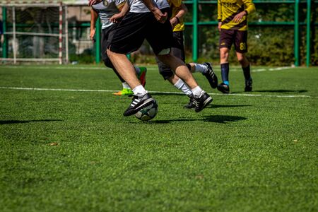MOSCOW, RUSSIA - AUGUST 24, 2019: Soccer players in game. Amateur league in Russia.のeditorial素材