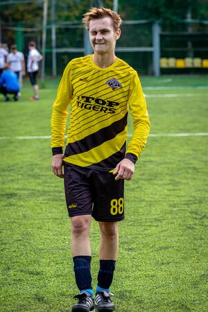 MOSCOW, RUSSIA - AUGUST 24, 2019: Soccer players in game. Amateur league in Russia.のeditorial素材