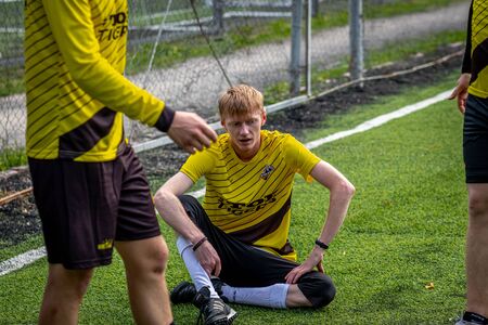 MOSCOW, RUSSIA - AUGUST 24, 2019: Soccer players in game. Amateur league in Russia.のeditorial素材