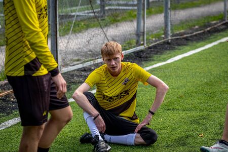MOSCOW, RUSSIA - AUGUST 24, 2019: Soccer players in game. Amateur league in Russia.のeditorial素材