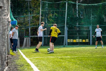 MOSCOW, RUSSIA - AUGUST 24, 2019: Soccer players in game. Amateur league in Russia.のeditorial素材