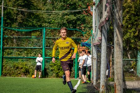 MOSCOW, RUSSIA - AUGUST 24, 2019: Soccer players in game. Amateur league in Russia.のeditorial素材