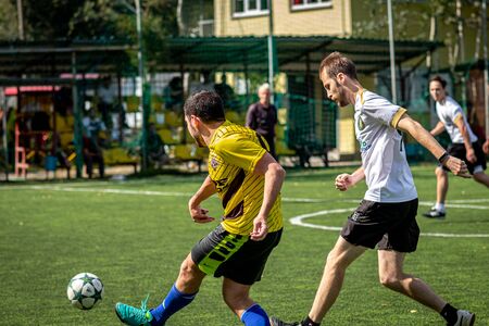 MOSCOW, RUSSIA - AUGUST 24, 2019: Soccer players in game. Amateur league in Moscow.のeditorial素材