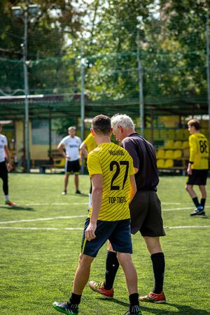 MOSCOW, RUSSIA - AUGUST 24, 2019: Soccer players in game. Amateur league in Moscow.のeditorial素材