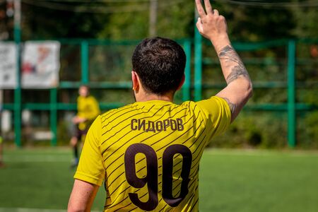MOSCOW, RUSSIA - AUGUST 24, 2019: Soccer players in game. Amateur league in Russia.のeditorial素材