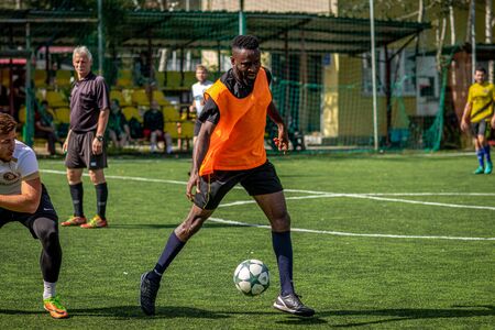 MOSCOW, RUSSIA - AUGUST 24, 2019: Soccer players in game. Amateur league in Moscow.のeditorial素材